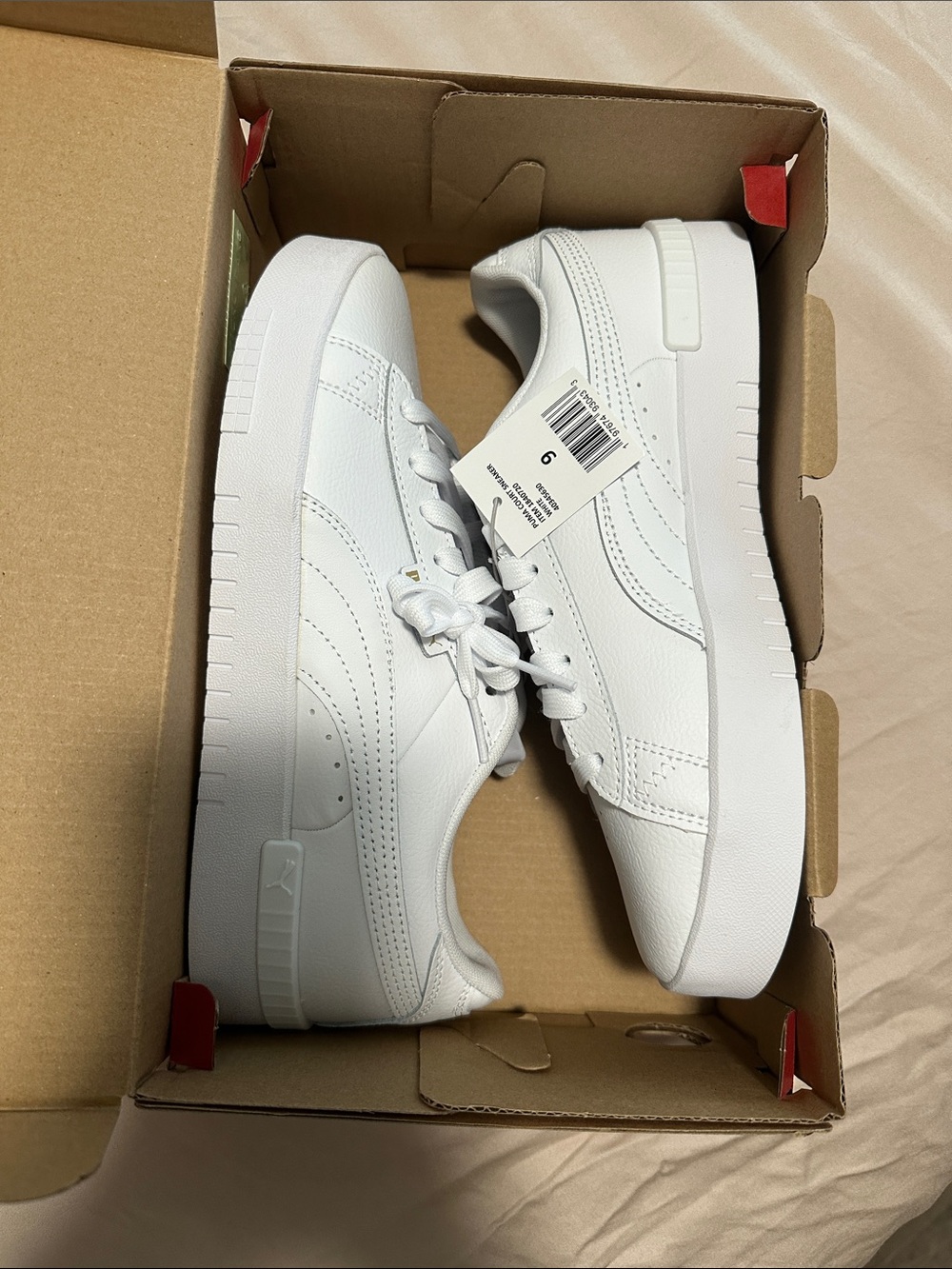 Puma womens All-White Low-Top Leather Sneakers